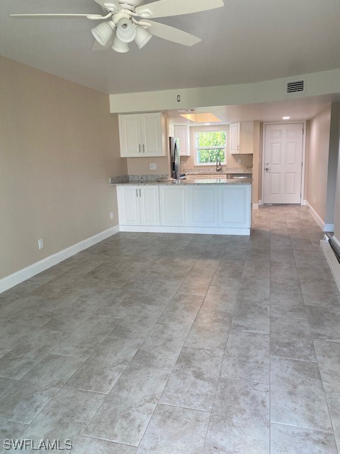 16007 Davis Road, Unit 515 Fort Myers, FL 33908 - Photo 5 of 14 a view of a kitchen with a sink and cabinets