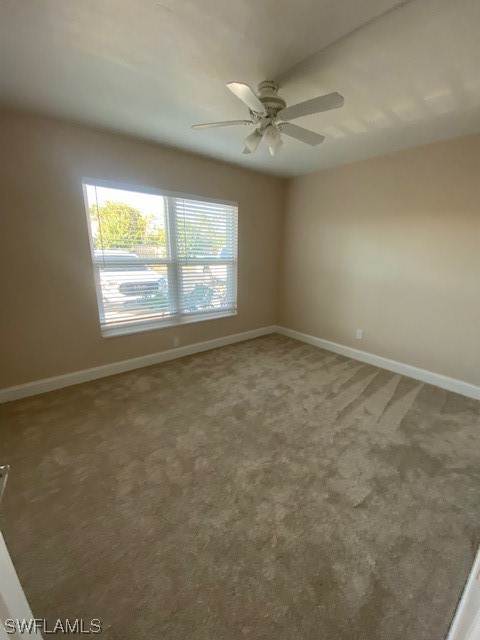 16007 Davis Road, Unit 515 Fort Myers, FL 33908 - Photo 10 of 14 an empty room with a window