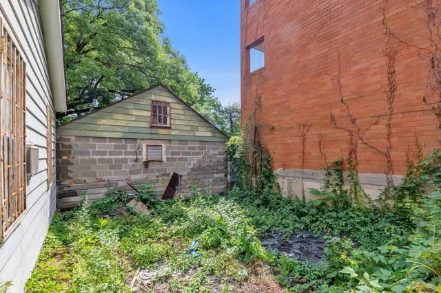 a backyard of a house with lots of green space