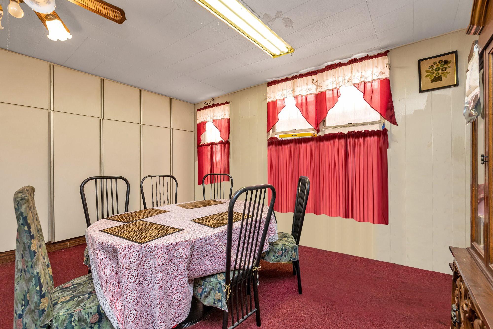 112-50 38th Avenue Queens, NY 11368 - Photo 9 of 17 a view of a dining room with furniture window and wooden floor