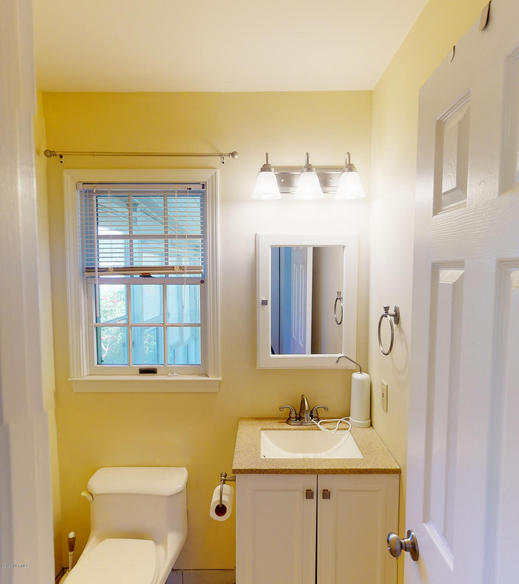 5779 Florence Road Merritt, NC 28556 - Photo 11 of 44 Half Bath off Mud Room