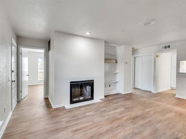 a view of a livingroom with a fireplace