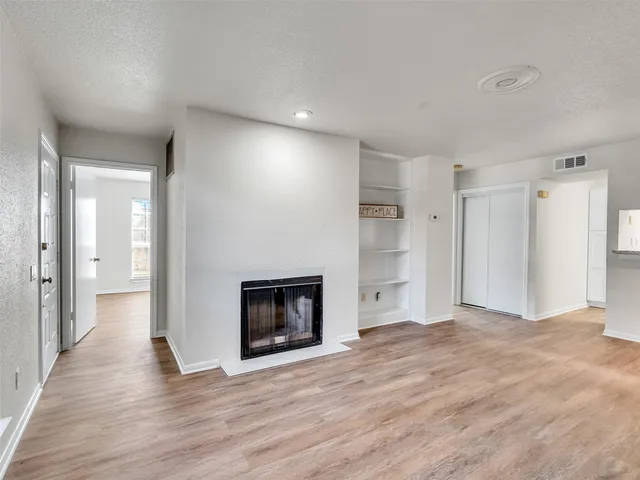 a view of a livingroom with a fireplace
