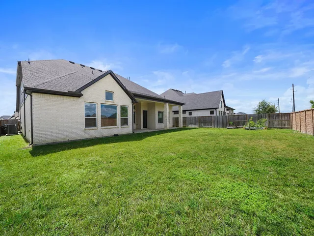 a house view with a garden space