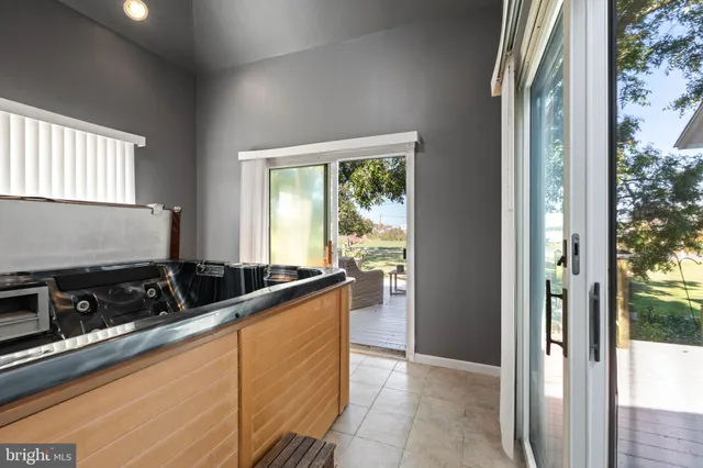 a kitchen with a stove and a refrigerator