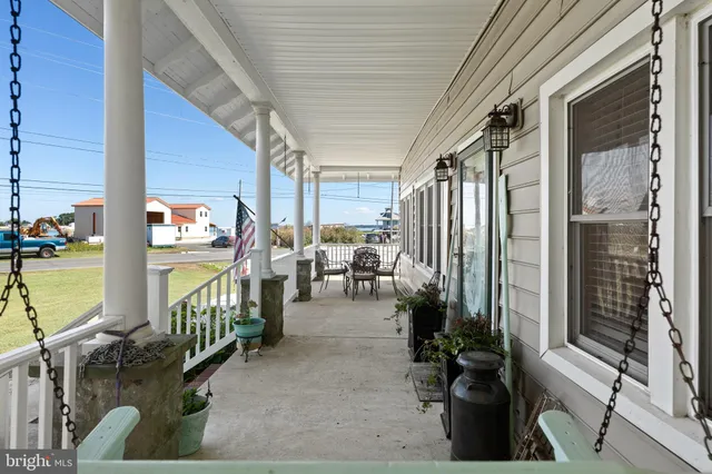 a view of house with outdoor seating