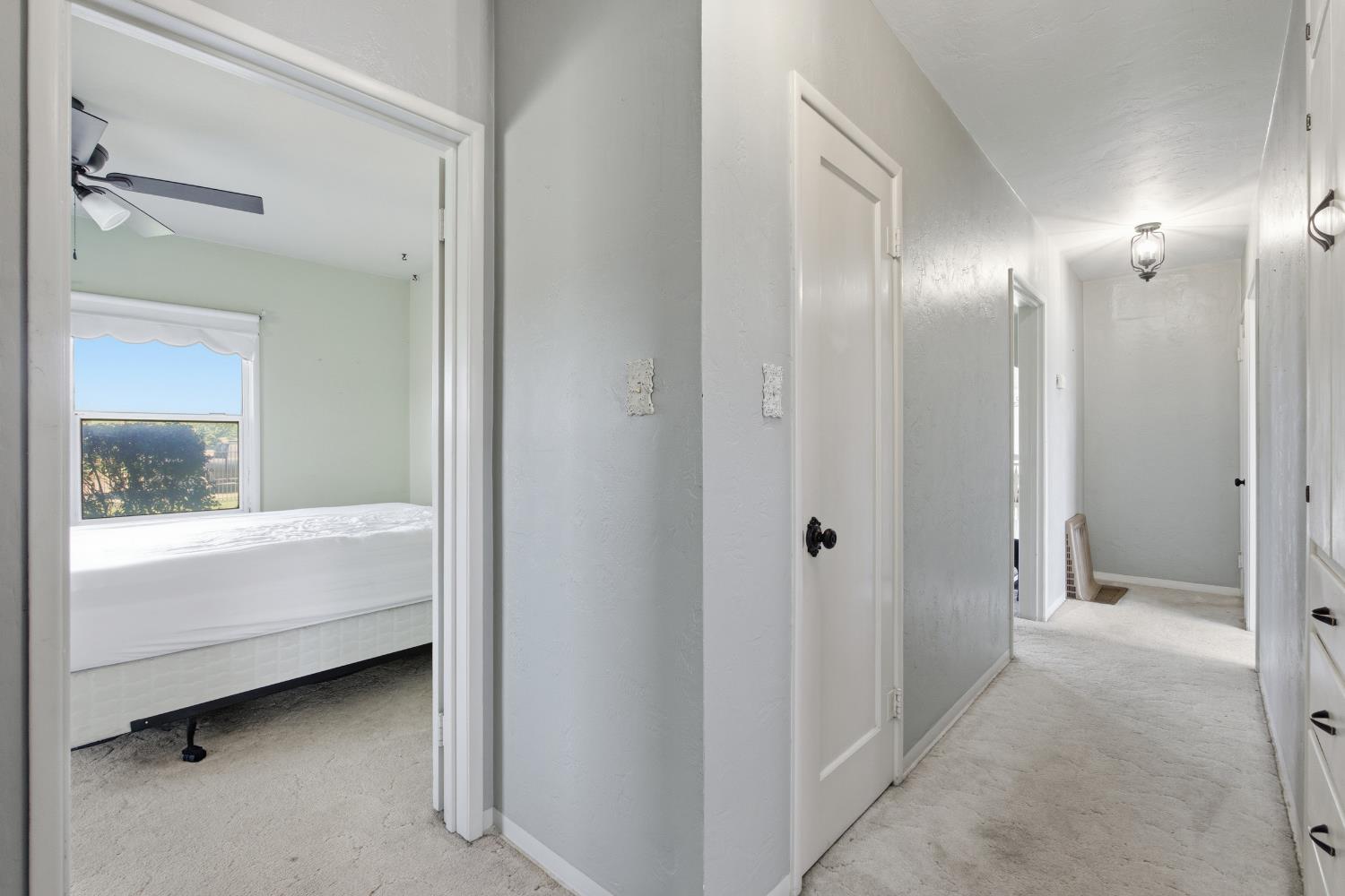 3058 7th Avenue Hanford, CA 93230 - Photo 12 of 38 a bathroom with a bathtub and a sink