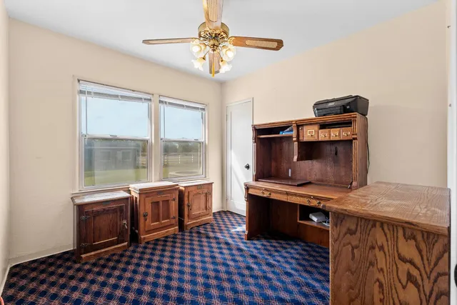 a room with furniture and window