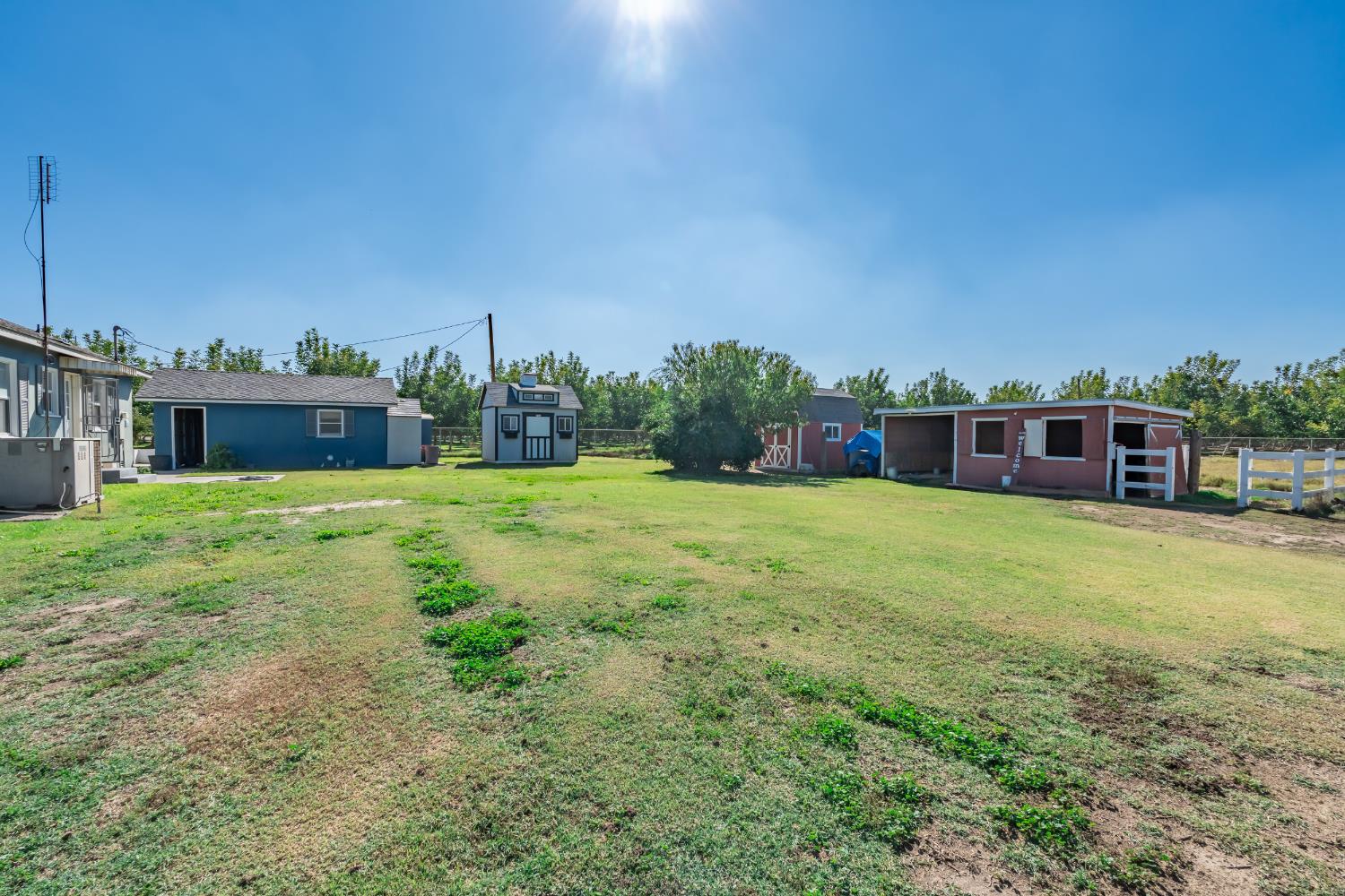 3058 7th Avenue Hanford, CA 93230 - Photo 24 of 38 a view of a house with a yard