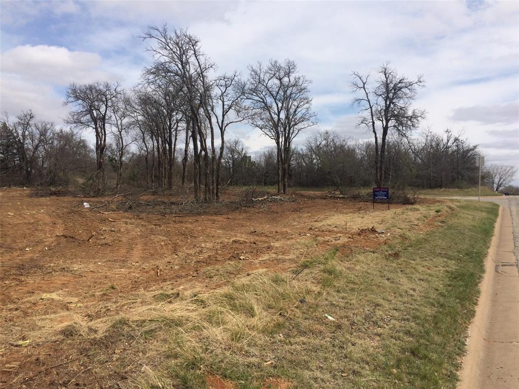 911 Pine Tree Court Graham, TX 76450 - Photo 2 of 6 a view of outdoor space with trees