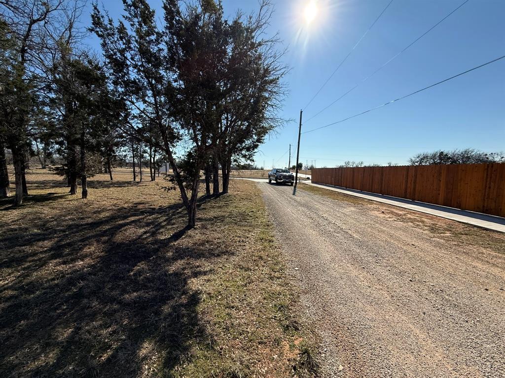 911 Pine Tree Court Graham, TX 76450 - Photo 6 of 6 a view of a outdoor space with trees