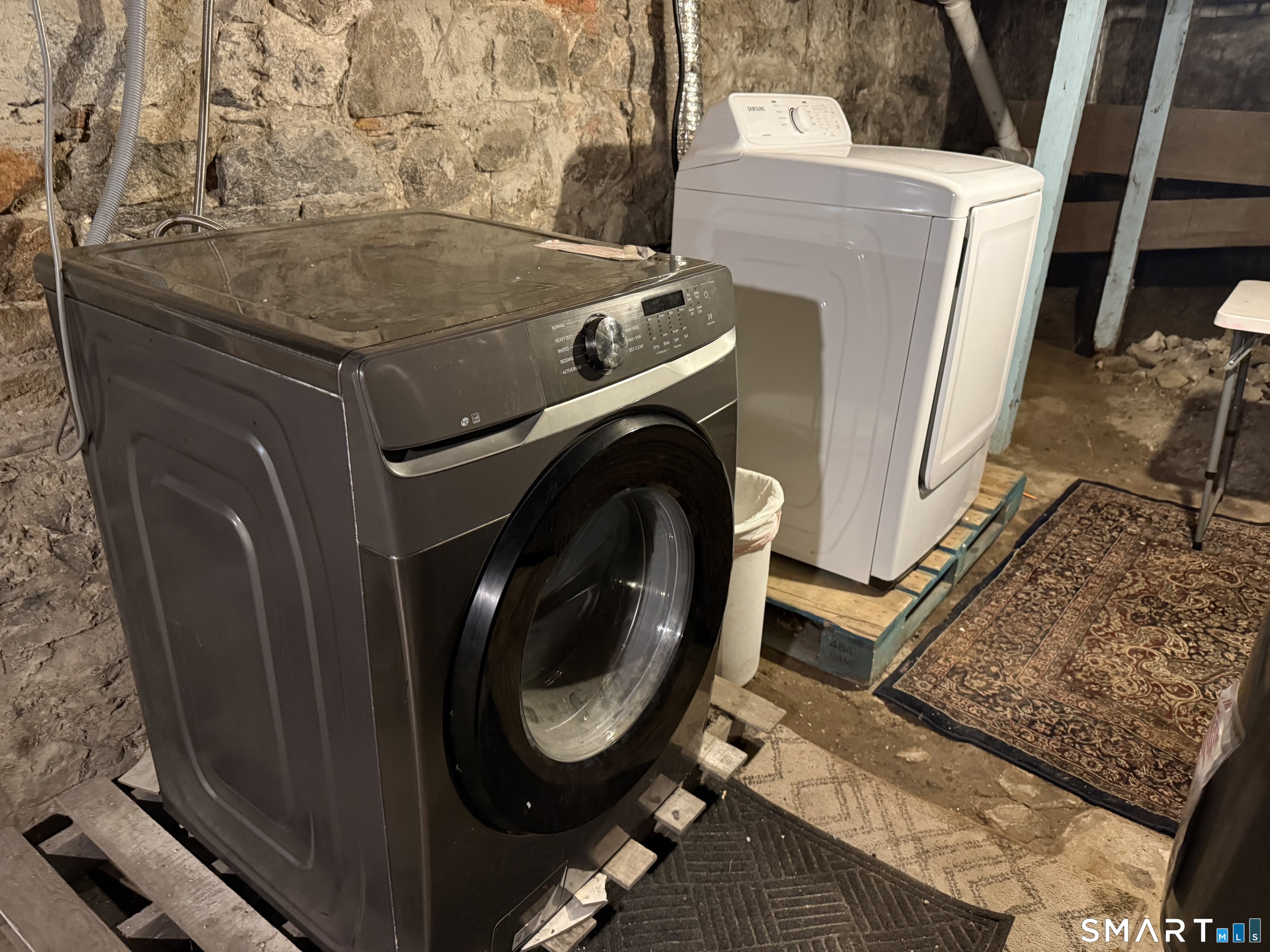 837 Bank Street, Unit 3 New London, CT 06320 - Photo 5 of 5 a utility room with dryer and washer