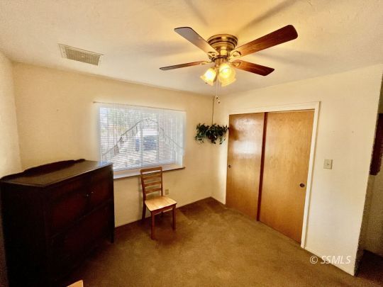 608 Heather Court Ridgecrest, CA 93555 - Photo 11 of 28 a workspace room with windows and furniture