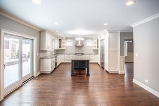 2366 Green Bay Road Highland Park, IL 60035 - Photo 11 of 37 a kitchen with kitchen island white cabinets and stainless steel appliances