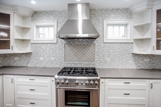 2366 Green Bay Road Highland Park, IL 60035 - Photo 12 of 37 a kitchen with a stove and white cabinets