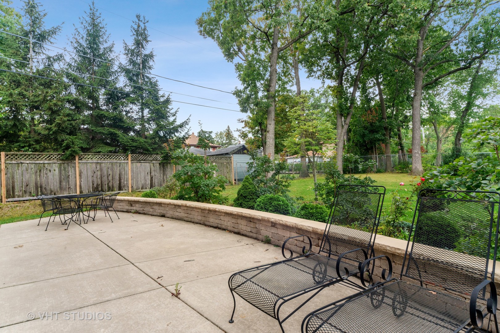 2366 Green Bay Road Highland Park, IL 60035 - Photo 20 of 37 a view of a patio with chairs and wooden fence
