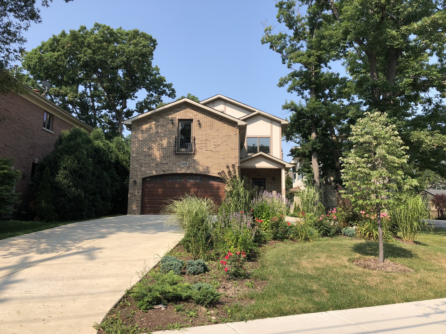 2366 Green Bay Road Highland Park, IL 60035 - Photo 2 of 37 a front view of a house with a yard