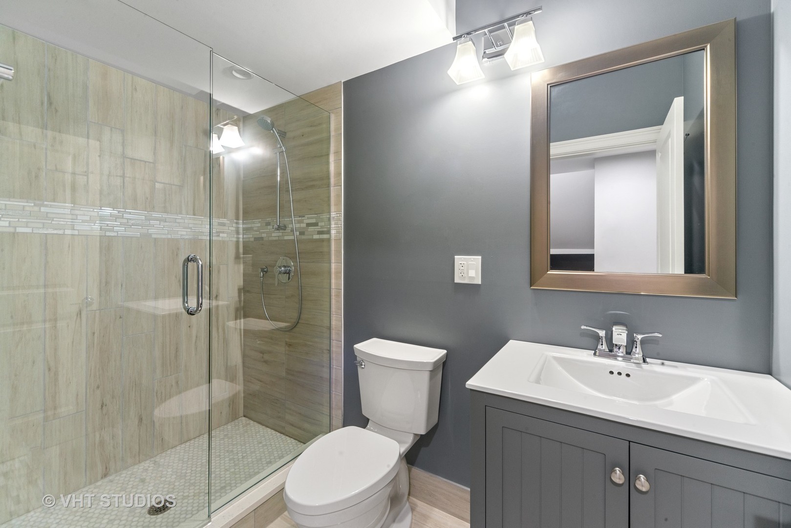 2366 Green Bay Road Highland Park, IL 60035 - Photo 25 of 37 a bathroom with a sink toilet and shower