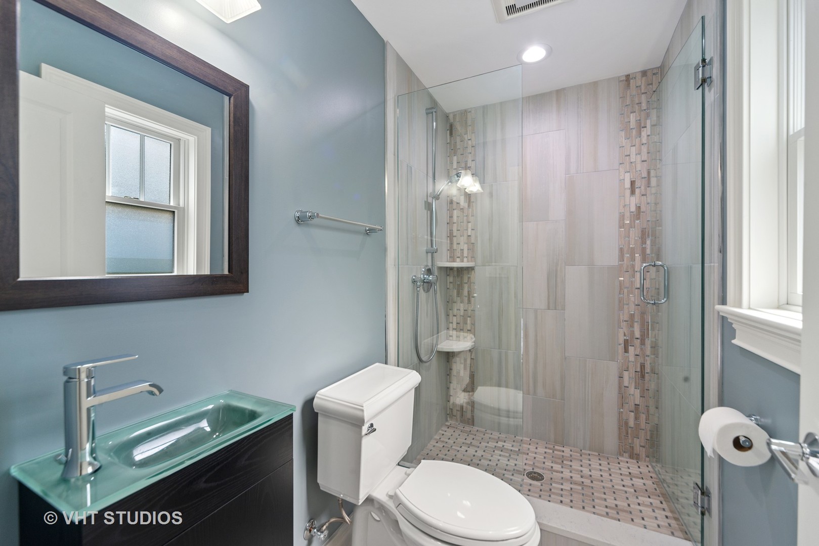 2366 Green Bay Road Highland Park, IL 60035 - Photo 29 of 37 a bathroom with a toilet a sink and shower