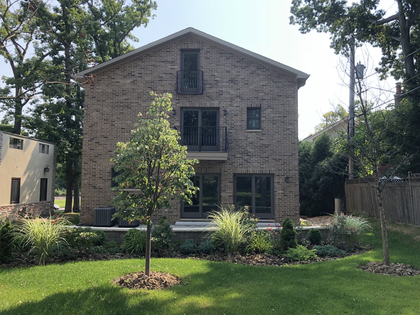2366 Green Bay Road Highland Park, IL 60035 - Photo 32 of 37 a front view of a house with a garden