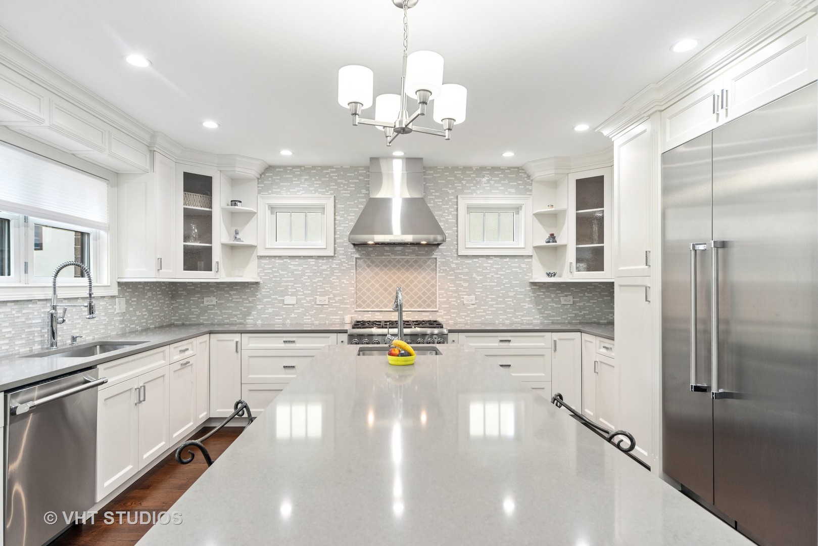 2366 Green Bay Road Highland Park, IL 60035 - Photo 5 of 37 a kitchen with stainless steel appliances granite countertop a refrigerator a sink dishwasher a stove and white cabinets with wooden floor