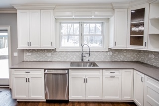 2366 Green Bay Road Highland Park, IL 60035 - Photo 9 of 37 a kitchen with granite countertop white cabinets and a window
