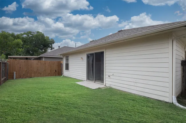 a kitchen with a refrigerator sink and microwave