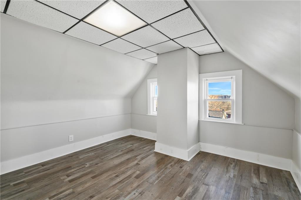 808 Bay Ridge Avenue Pittsburgh, PA 15226 - Photo 19 of 34 a view of a room with wooden floor and windows