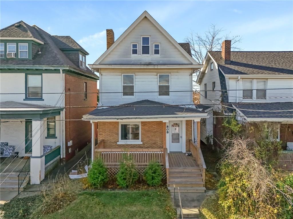 808 Bay Ridge Avenue Pittsburgh, PA 15226 - Photo 2 of 34 a front view of a house with a yard