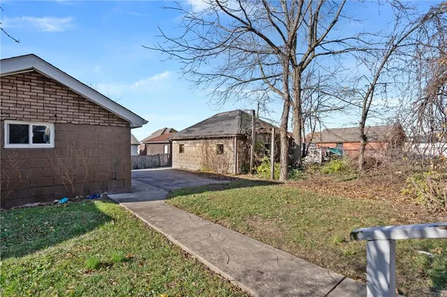 a house view with a backyard space