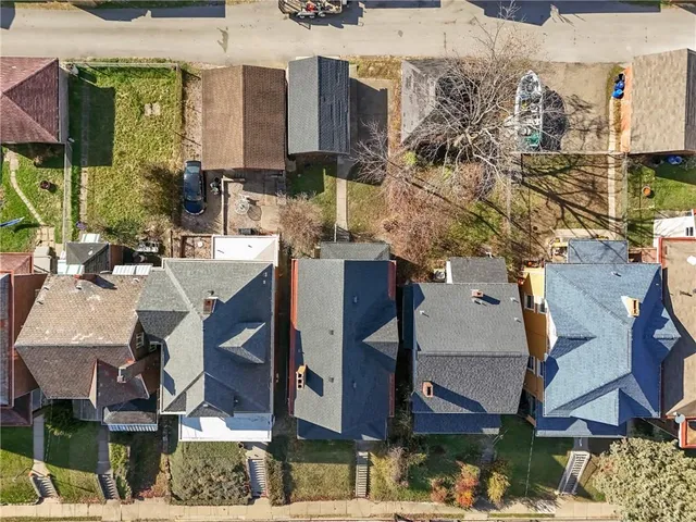 a view of multiple houses with outdoor space