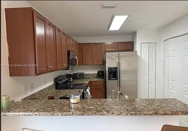 $399,000 | 11603 Northwest 89th Street, Unit 214, Doral, FL 33178
