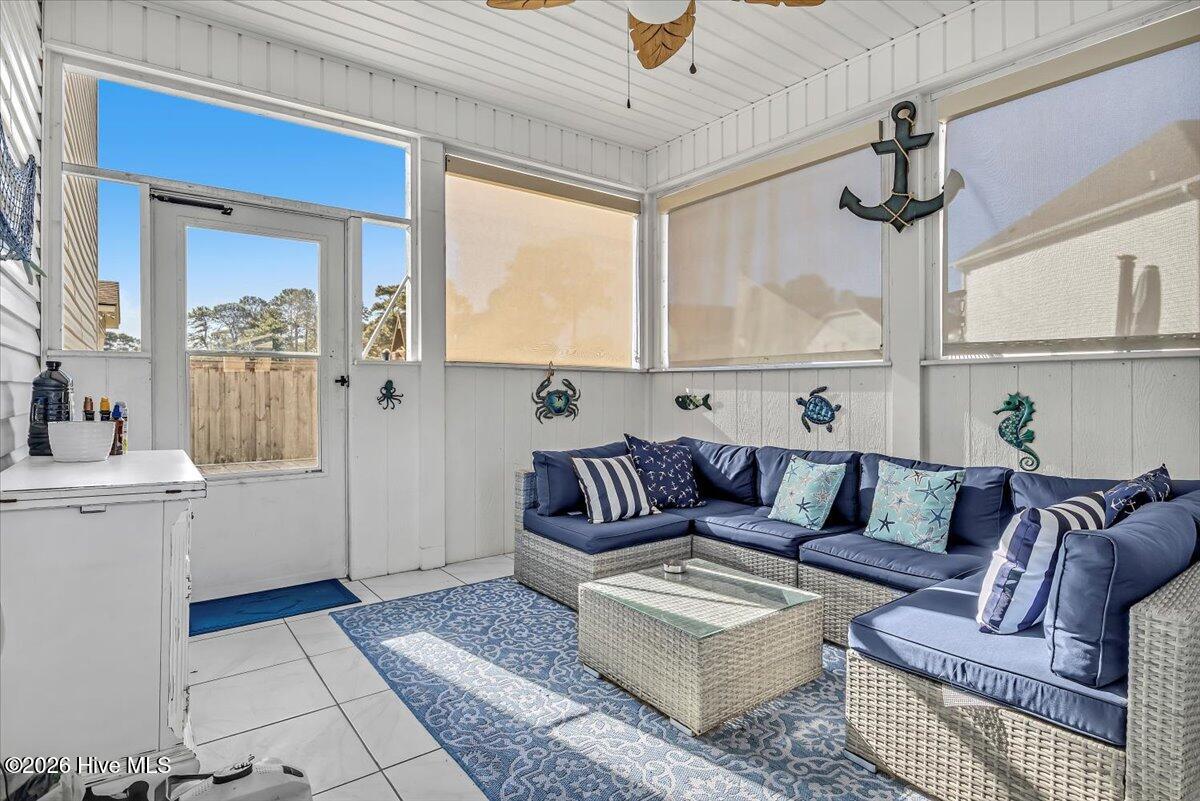 601 Aurora Place Hampstead, NC 28443 - Photo 19 of 30 Enclosed Porch