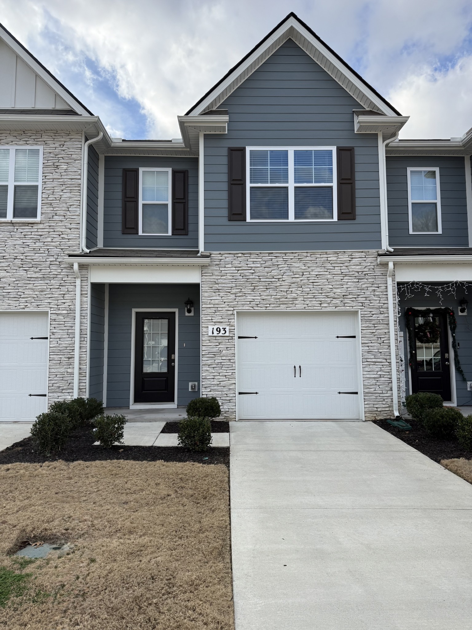 193 Mackenzie Way Lewisburg, TN 37091 - Photo 1 of 20 a front view of a house with yard and parking