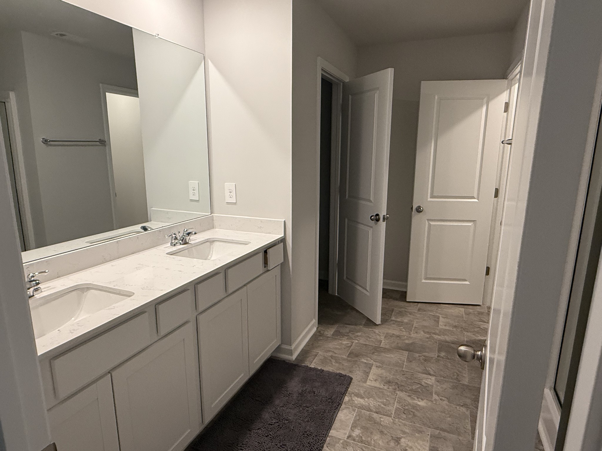 193 Mackenzie Way Lewisburg, TN 37091 - Photo 14 of 20 a bathroom with a sink and a mirror