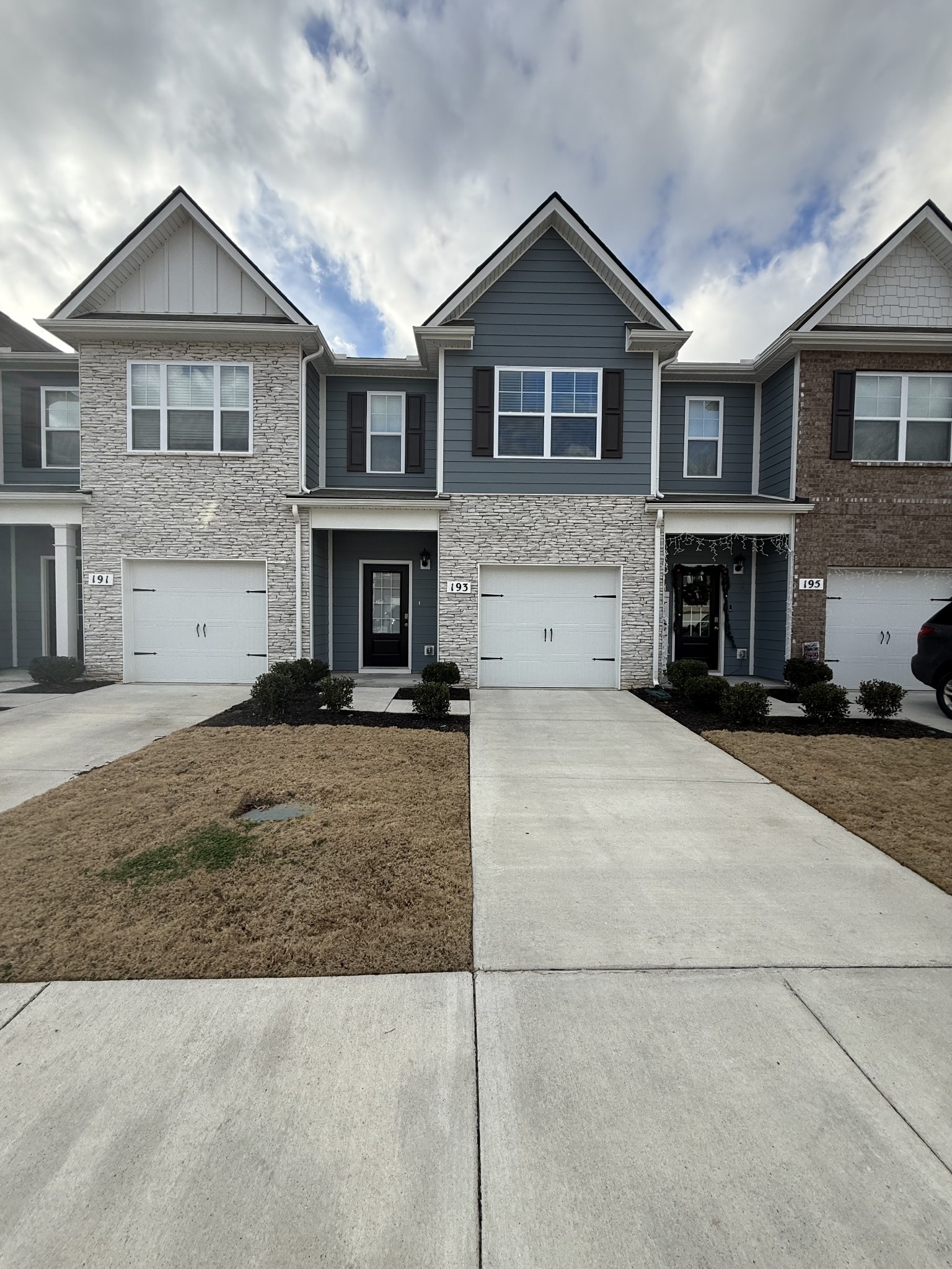 193 Mackenzie Way Lewisburg, TN 37091 - Photo 2 of 20 a view of a brick house with large windows