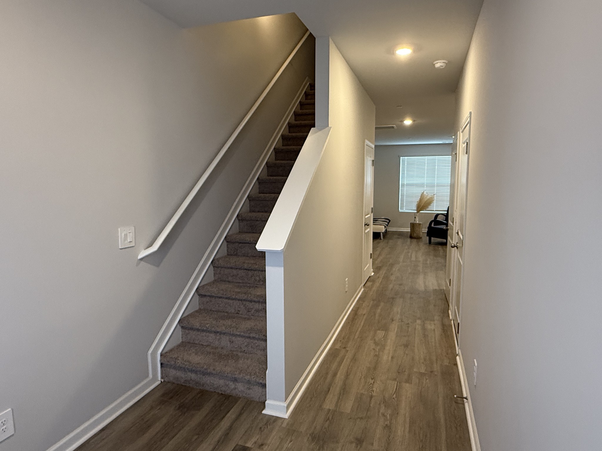 193 Mackenzie Way Lewisburg, TN 37091 - Photo 4 of 20 a view of entryway and hall with wooden floor
