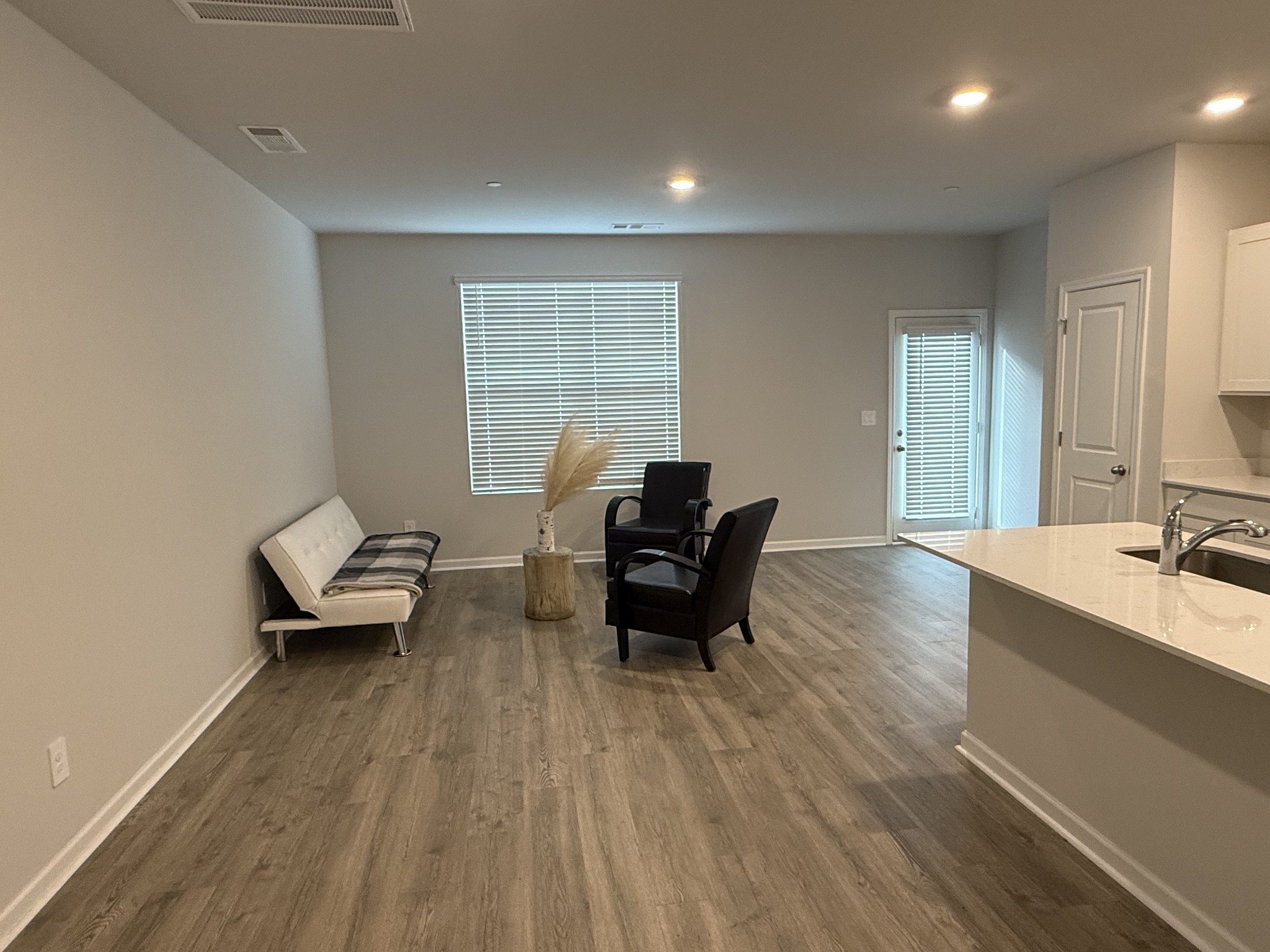 193 Mackenzie Way Lewisburg, TN 37091 - Photo 5 of 20 a living room with furniture and a wooden floor