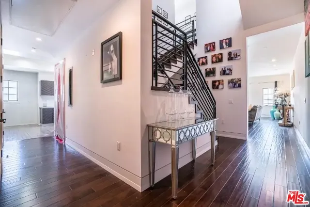 a view of entryway with wooden floor