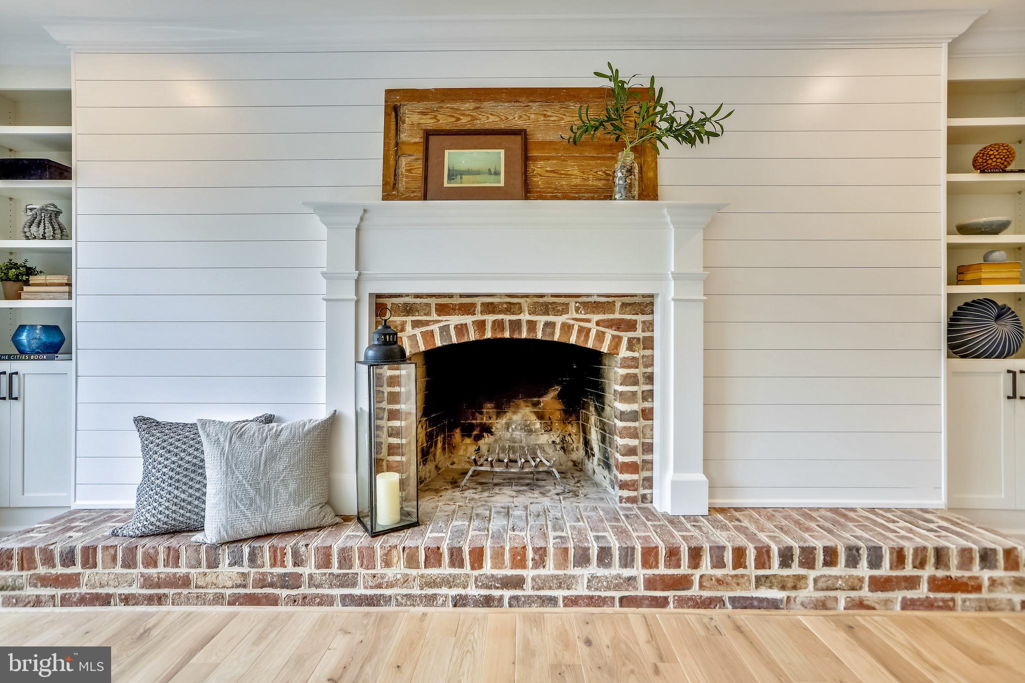 451 Ferry Point Road Annapolis, MD 21403 - Photo 19 of 64 Shiplap surround with beautiful brick threshold
