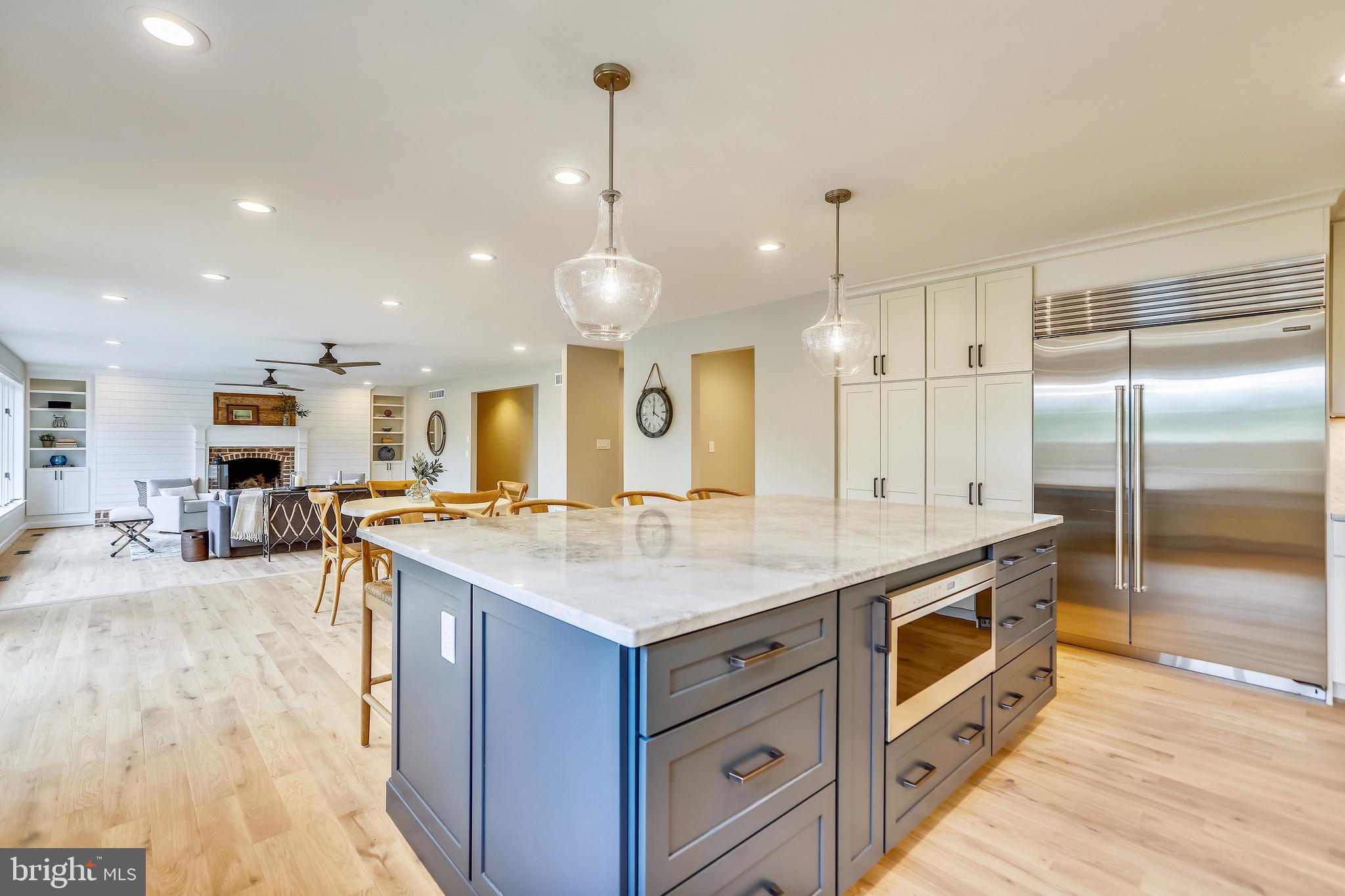 451 Ferry Point Road Annapolis, MD 21403 - Photo 21 of 64 Custom blue base cabinetry, microwave drawer