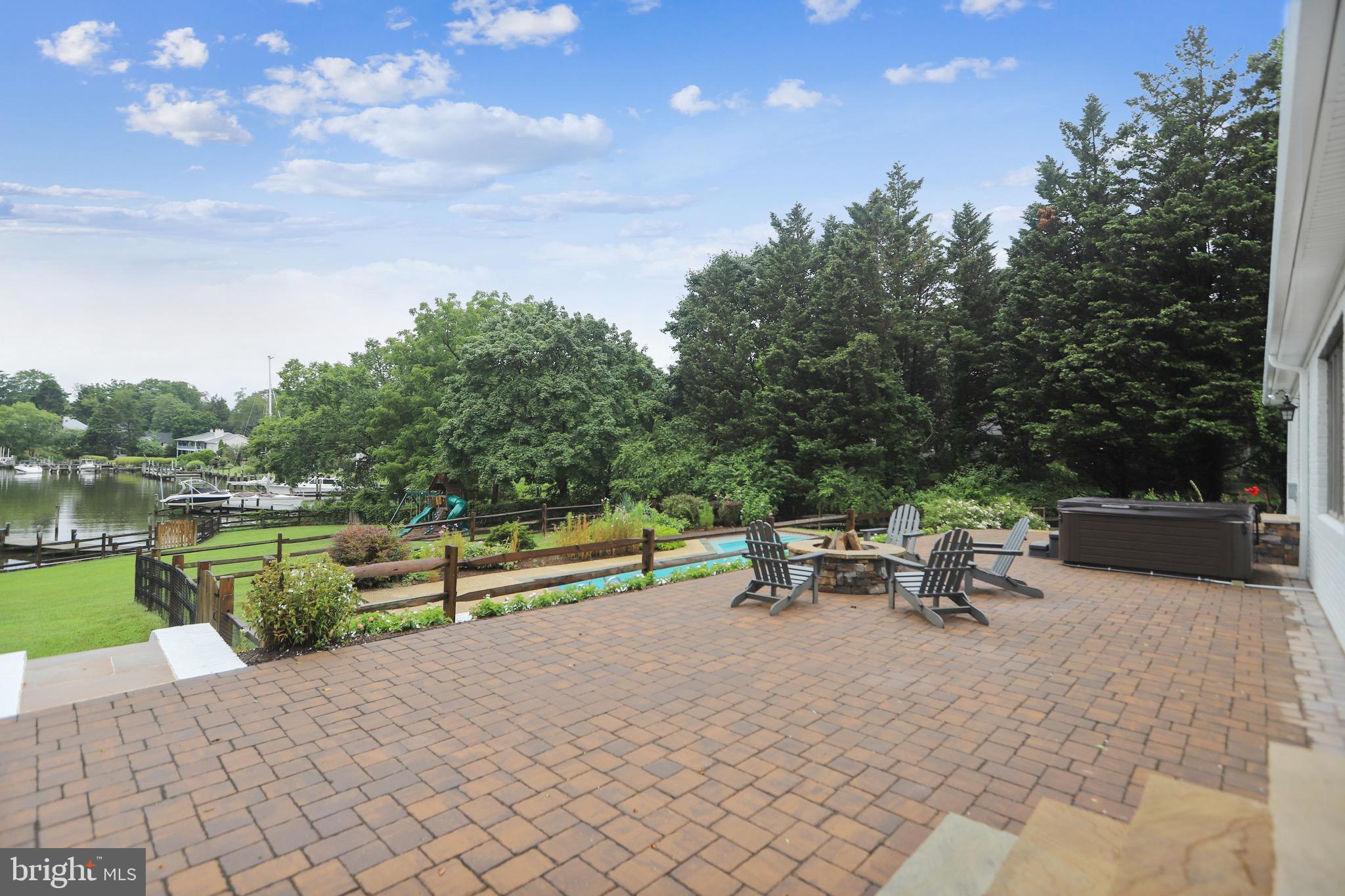 451 Ferry Point Road Annapolis, MD 21403 - Photo 60 of 64 Patio and fire pit overlooking pool
