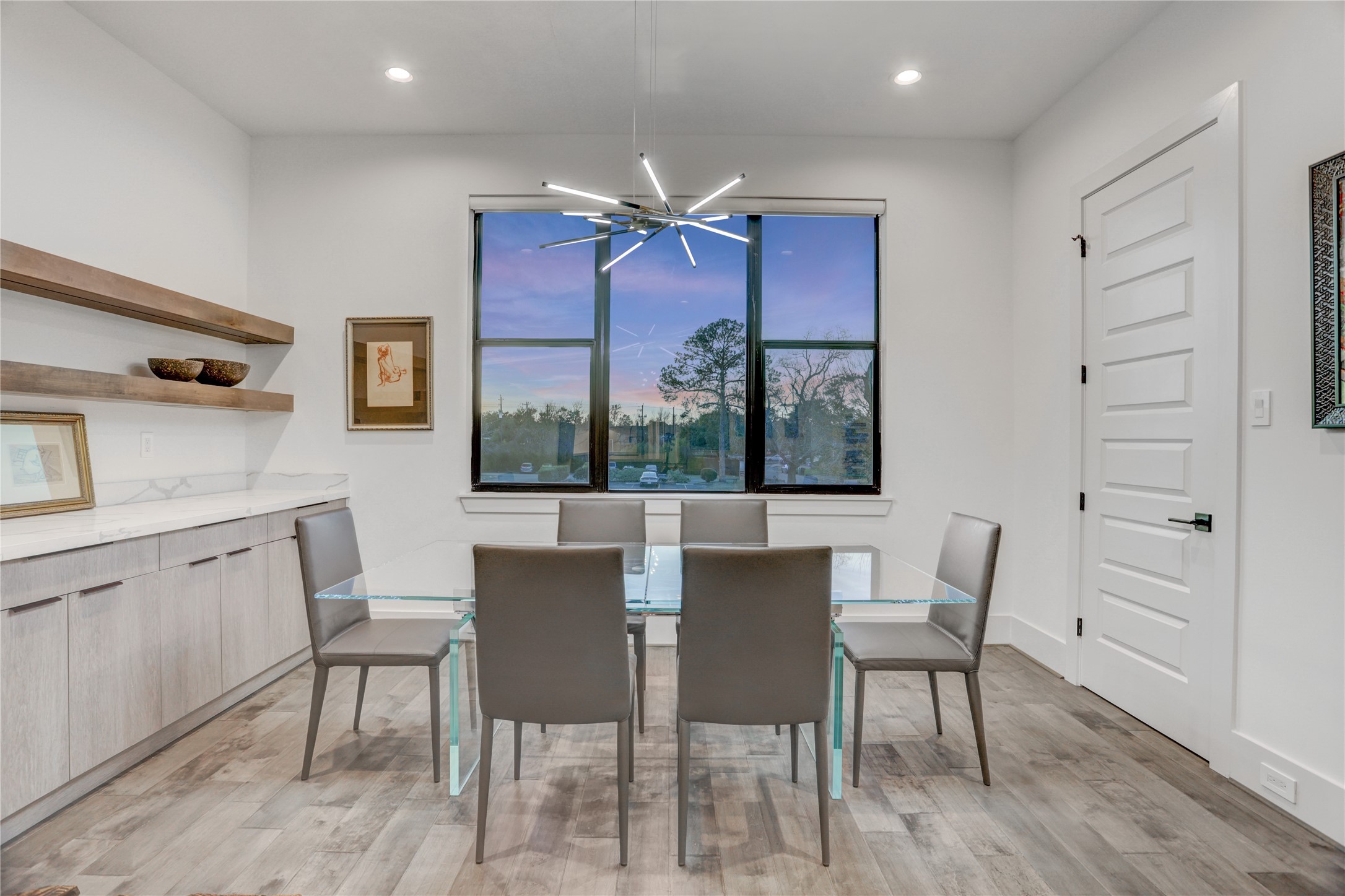 2435 Sheridan Street Houston, TX 77030 - Photo 11 of 25 a view of a dining room with furniture window and wooden floor