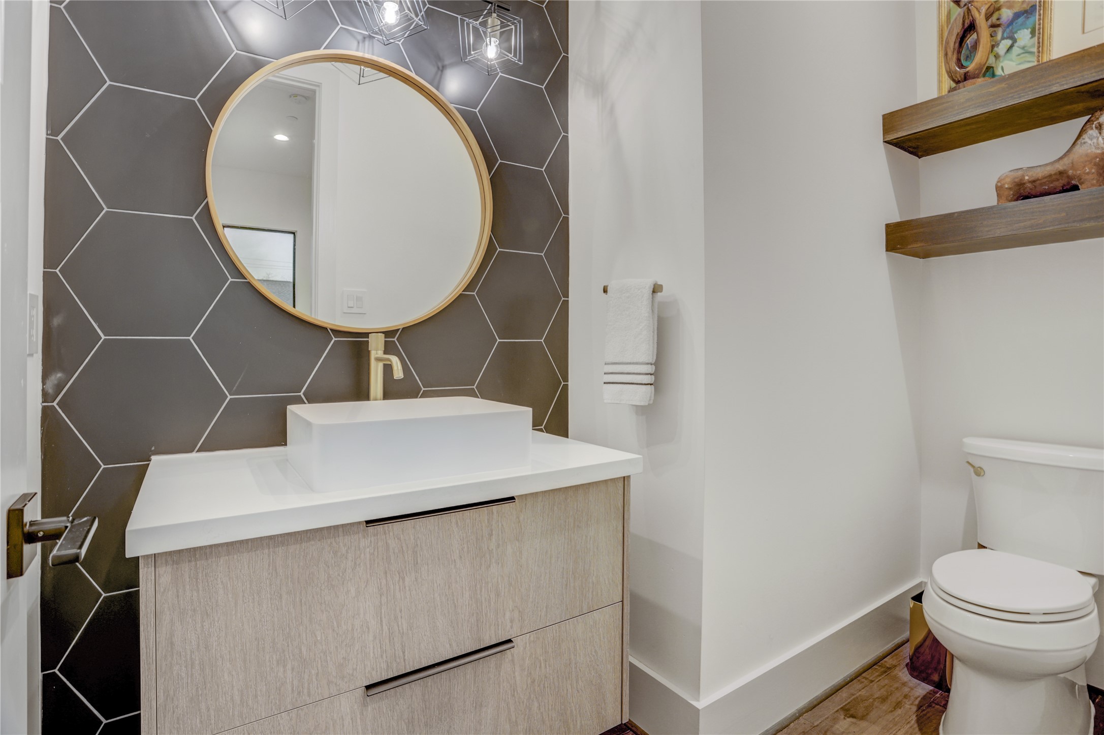2435 Sheridan Street Houston, TX 77030 - Photo 13 of 25 a bathroom with a sink mirror and toilet