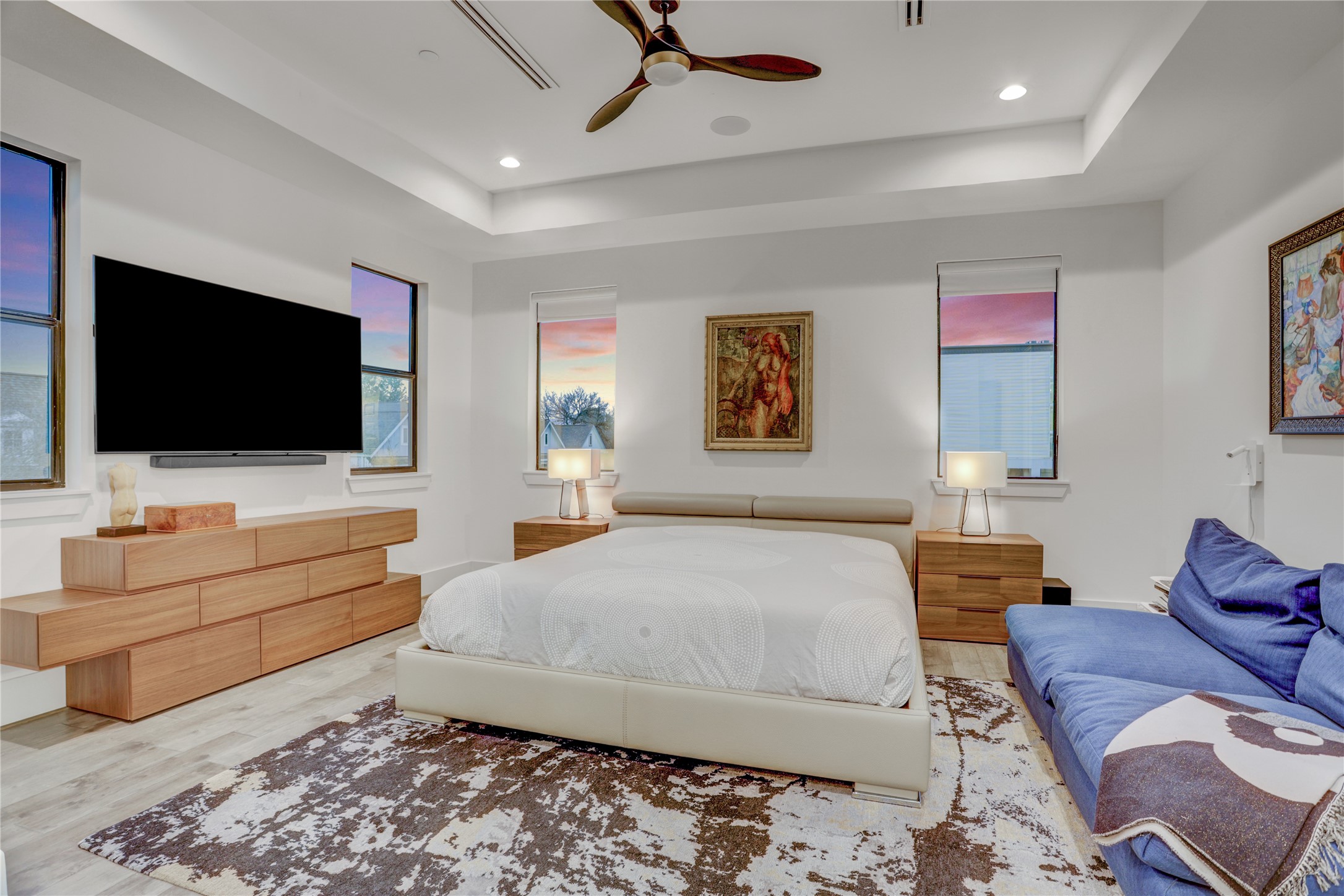 2435 Sheridan Street Houston, TX 77030 - Photo 14 of 25 a bedroom with a bed and a flat screen tv