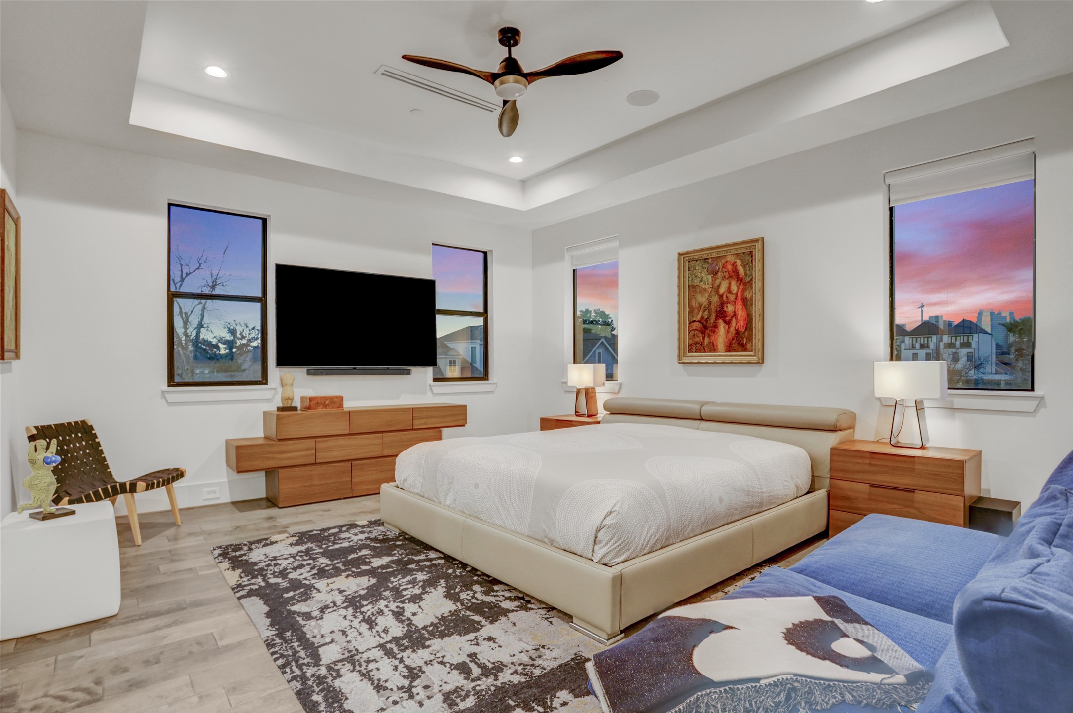 2435 Sheridan Street Houston, TX 77030 - Photo 15 of 25 a bedroom with a bed and a flat screen tv