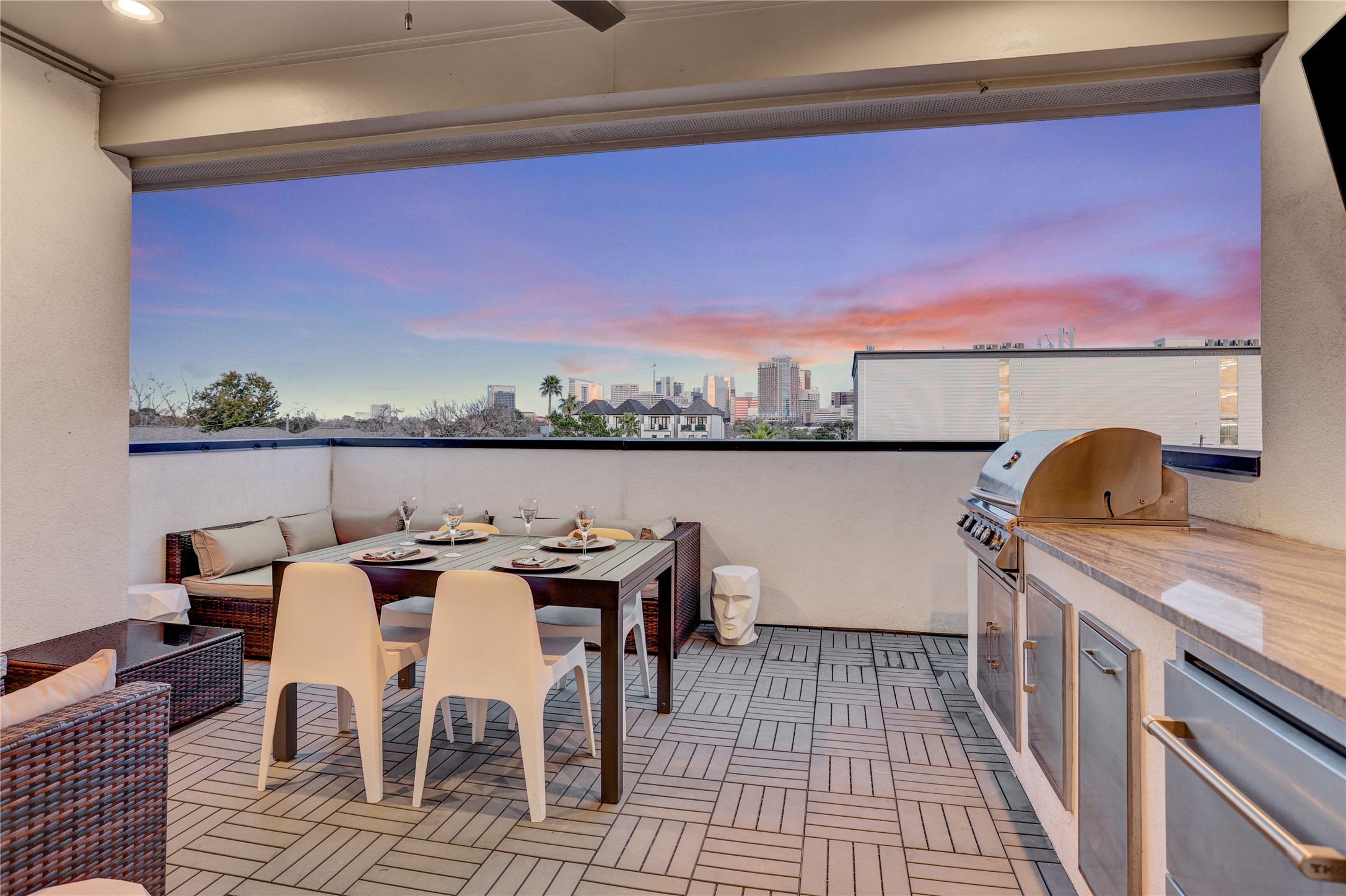 2435 Sheridan Street Houston, TX 77030 - Photo 18 of 25 Experience luxury living with a stunning 4th-floor outdoor kitchen and patio, offering breathtaking views and perfect for entertaining.