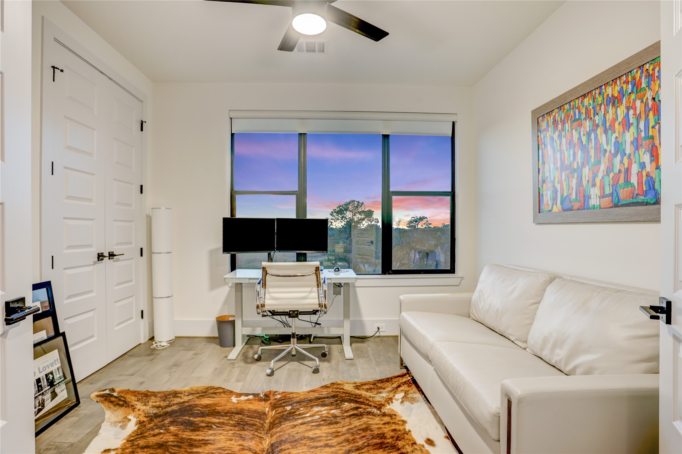 2435 Sheridan Street Houston, TX 77030 - Photo 21 of 25 Modern home office/secondary bedroom featuring ample natural light with a serene view.