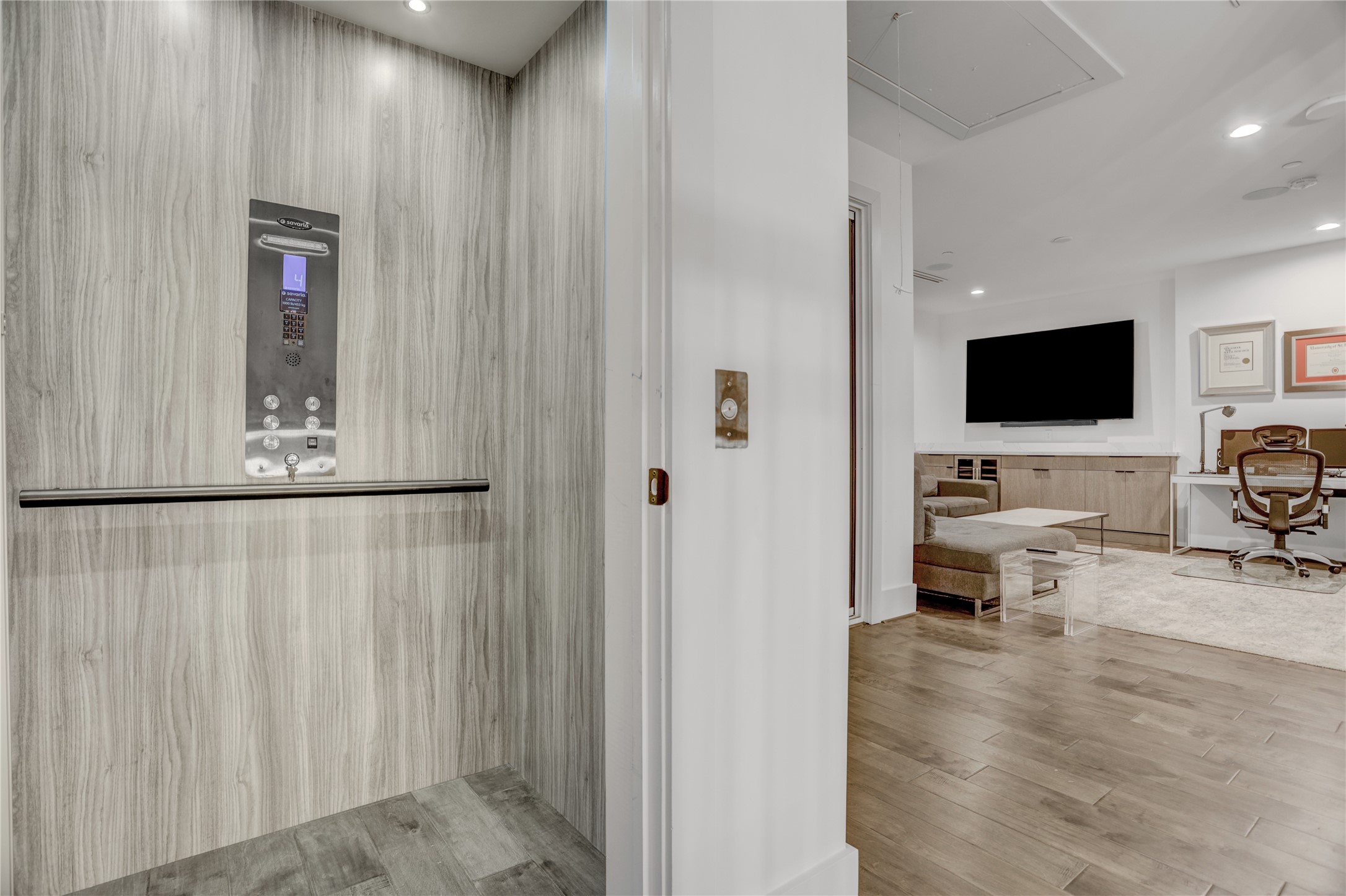 2435 Sheridan Street Houston, TX 77030 - Photo 22 of 25 a view of a livingroom with workspace and a couch