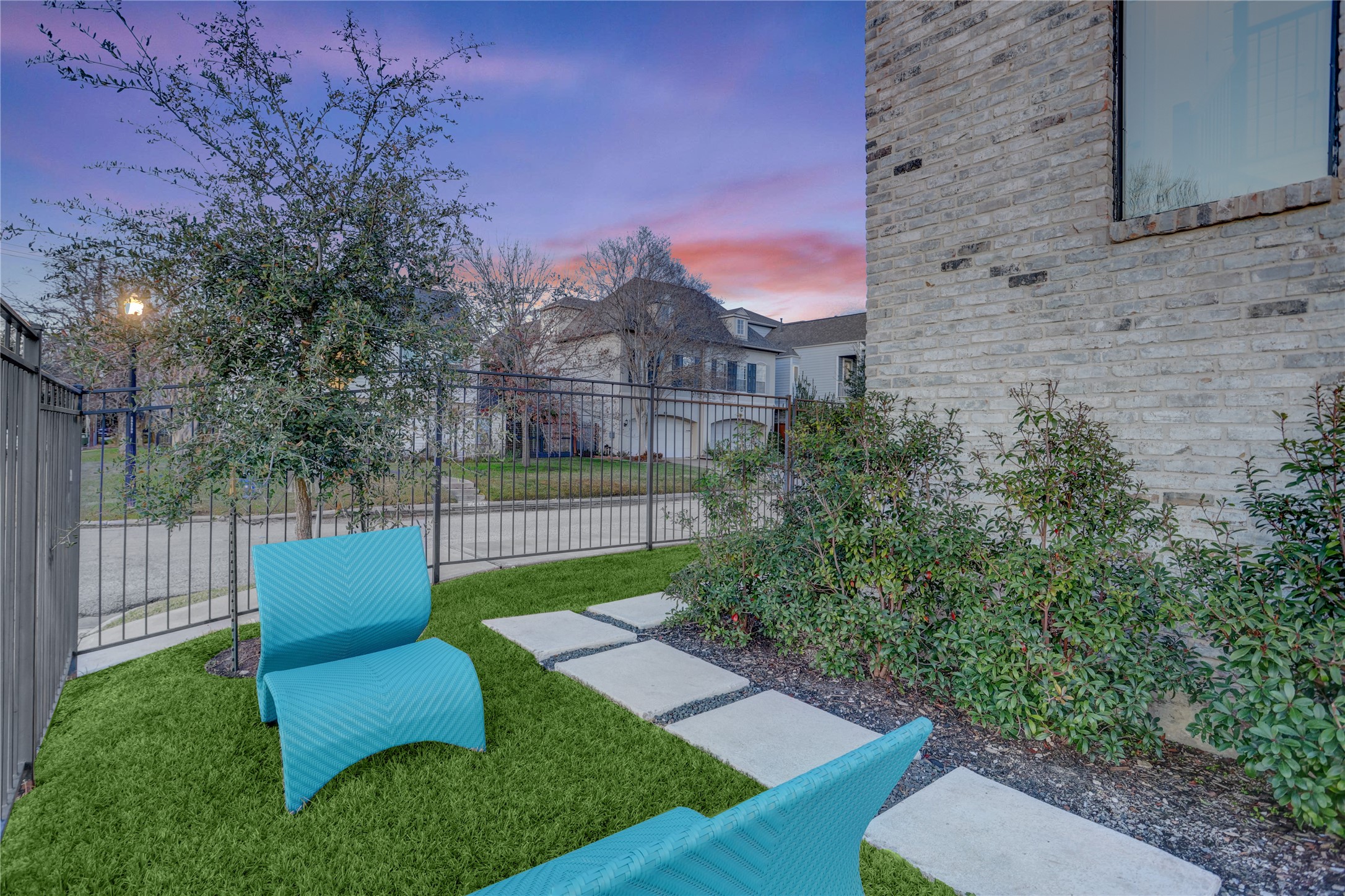 2435 Sheridan Street Houston, TX 77030 - Photo 24 of 25 Secure and private yard with elegant gating.